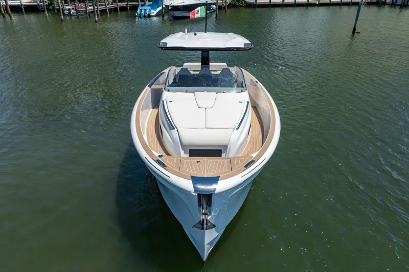  Yacht Photos Pics 2027 Solaris Power 40 Open yacht on calm water, showcasing sleek design and luxury features.