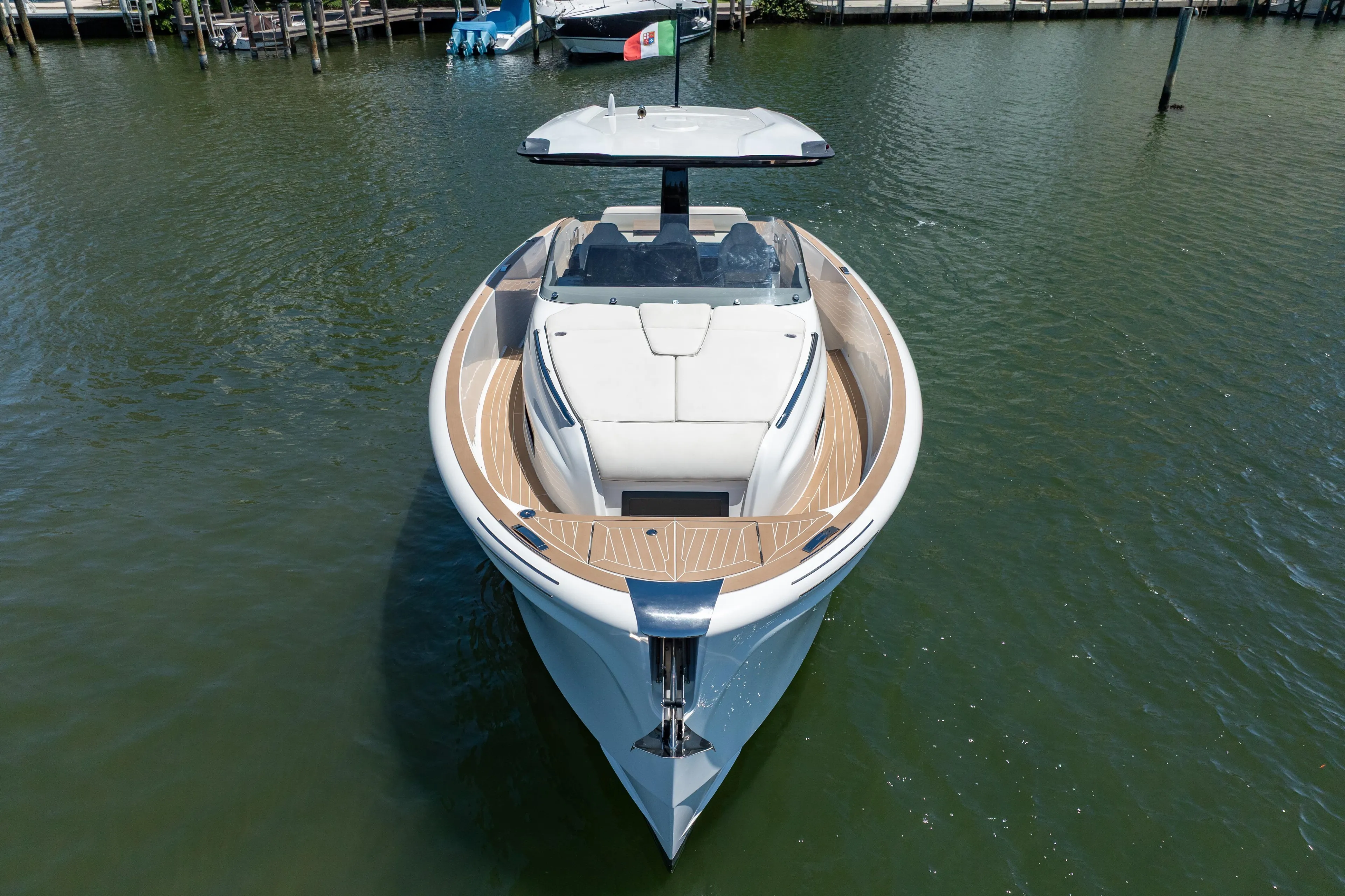 2027 Solaris Power 40 Open yacht on calm water, showcasing sleek design and luxury features.