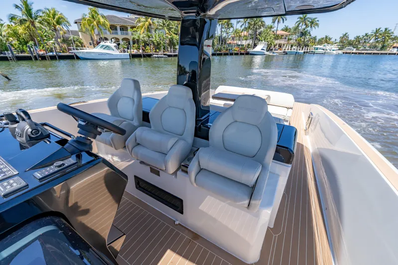  Yacht Photos Pics 2027 Solaris Power 40 Open yacht interior with luxurious seating and modern controls.