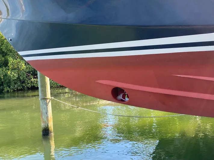 Red Castles Yacht Photos Pics Close-up of 2000 Little Harbor 42 Whisper Jet hull in water.