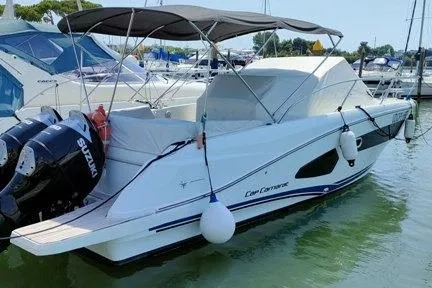  Yacht Photos Pics 2019 Jeanneau Cap Camarat 10.5 WA boat docked with Suzuki outboard engines.