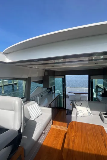  Yacht Photos Pics 2020 Tiara Yachts 53 Coupe interior with modern design and ocean view.