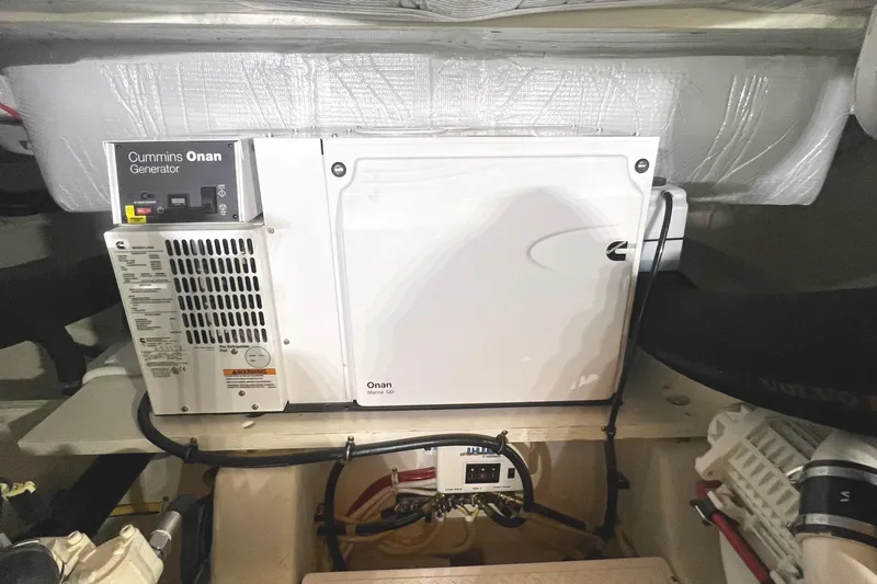  Yacht Photos Pics Cummins Onan generator in 2020 Tiara Yachts C53 Coupe engine room.