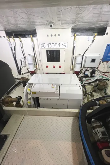  Yacht Photos Pics Engine room of 2020 Tiara Yachts C53 Coupe with equipment and wiring.