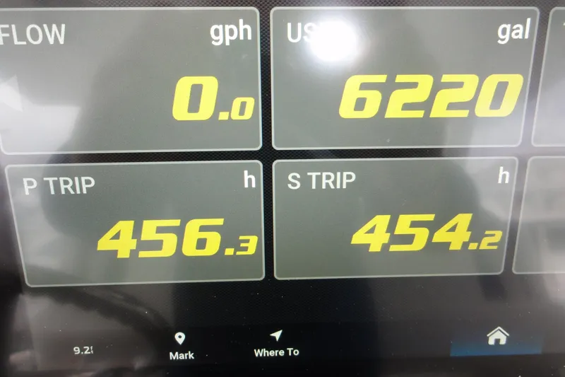  Yacht Photos Pics Dashboard display of 2024 Pursuit S 328 Sport showing fuel and trip data.