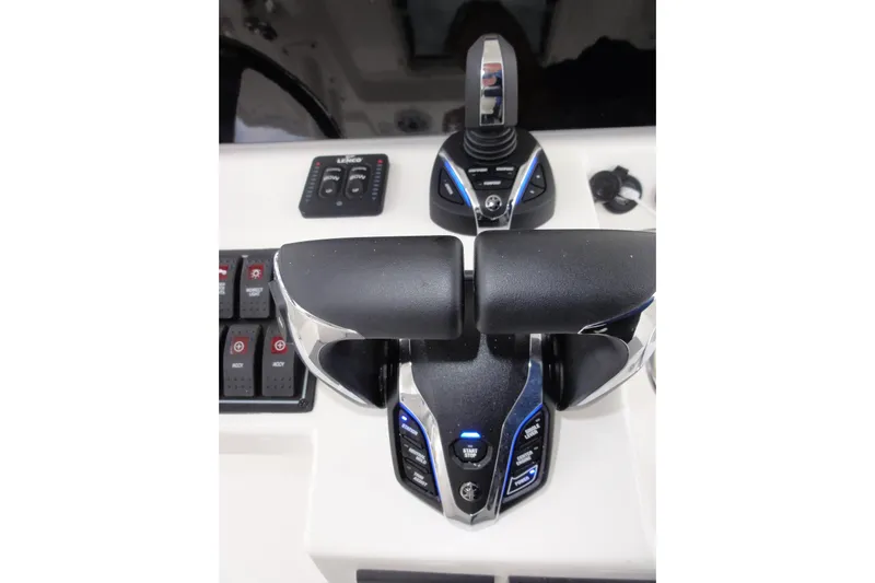  Yacht Photos Pics 2024 Pursuit S 328 Sport boat controls with advanced throttle system.