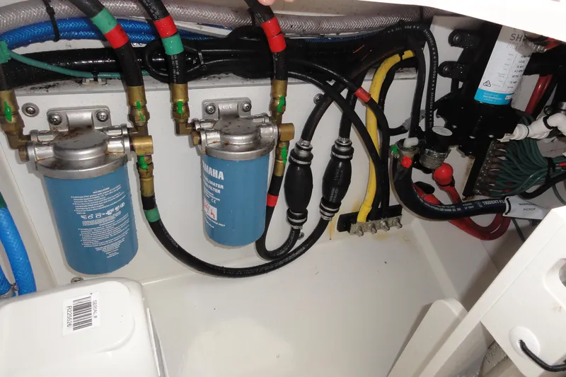  Yacht Photos Pics Engine compartment of 2024 Pursuit S 328 Sport with fuel filters and hoses.