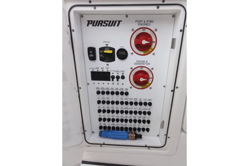  Yacht Photos Pics 2024 Pursuit S 328 Sport control panel with engine and generator switches.