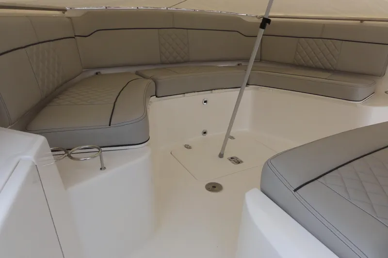  Yacht Photos Pics 2024 Pursuit S 328 Sport boat interior with luxurious seating and modern design.