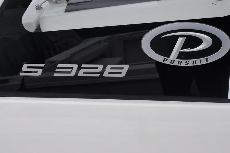  Yacht Photos Pics 2024 Pursuit S 328 Sport boat logo and model name on display.