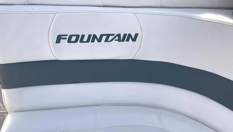  Yacht Photos Pics 2002 Fountain 38 Express Cruiser boat seat with logo.