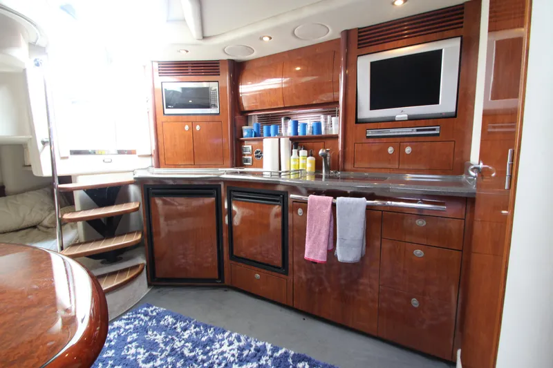  Yacht Photos Pics Luxurious 2004 Sea Ray 40 Sundancer yacht interior with modern kitchen amenities.