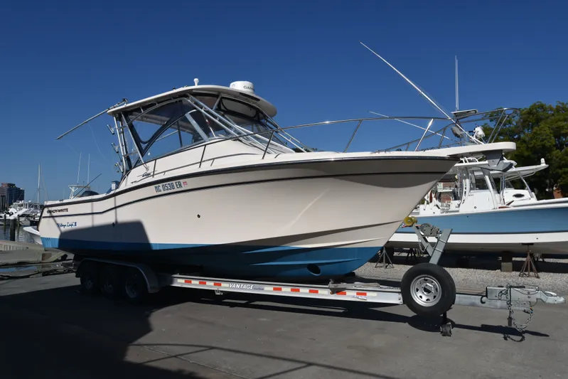 Katherine Leigh III Yacht Photos Pics 2008 Grady-White Express 305 boat on trailer at marina.