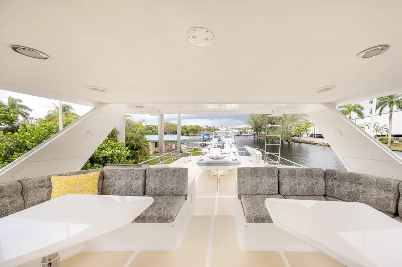 Journey Yacht Photos Pics Luxurious 2008 Outer Reef Yachts 650 Motoryacht interior with elegant seating and scenic waterway view.