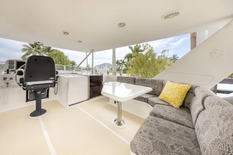 Journey Yacht Photos Pics Luxurious 2008 Outer Reef Yachts 650 Motoryacht flybridge with seating and helm station.