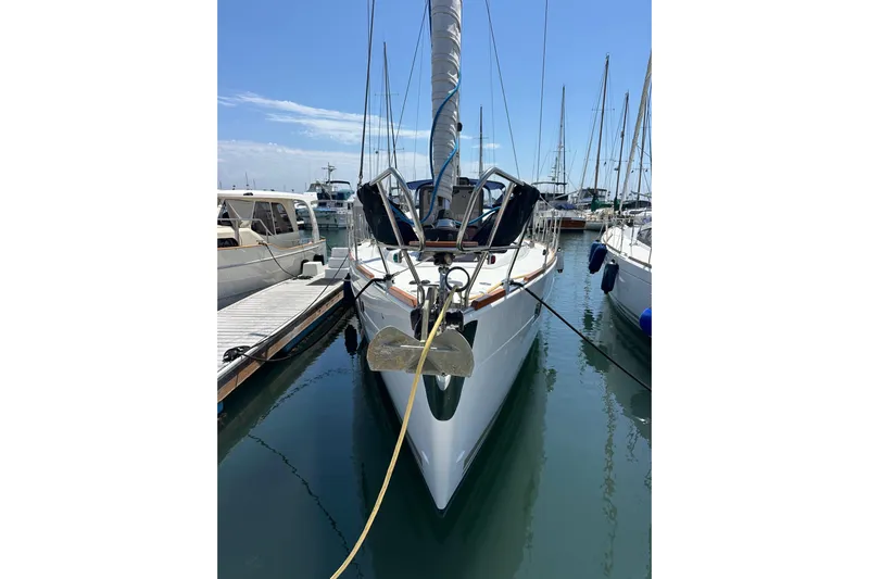 In Stock Now Yacht Photos Pics 2018 Elan 45 Impressions yacht docked in marina, clear sky, calm water.