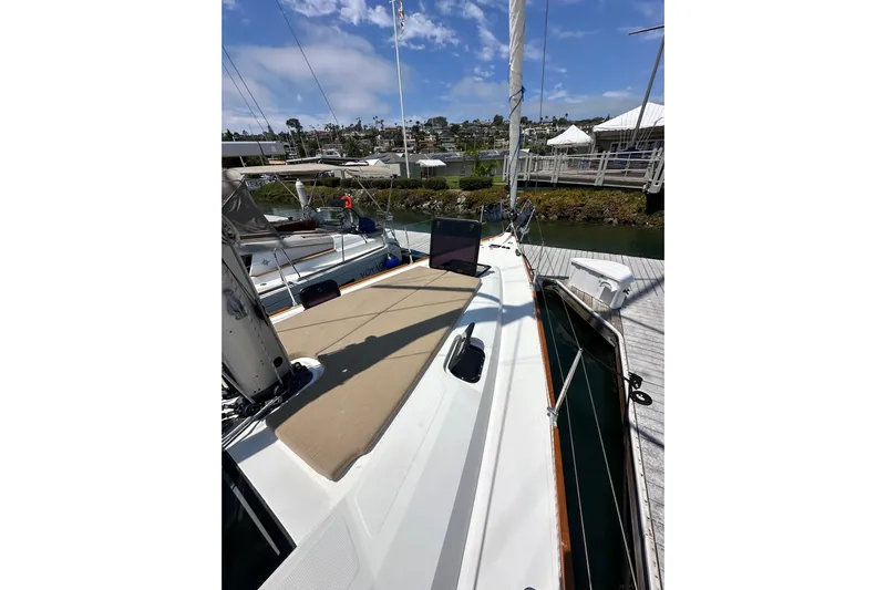 In Stock Now Yacht Photos Pics 2018 Elan 45 Impressions yacht docked at marina under blue sky.