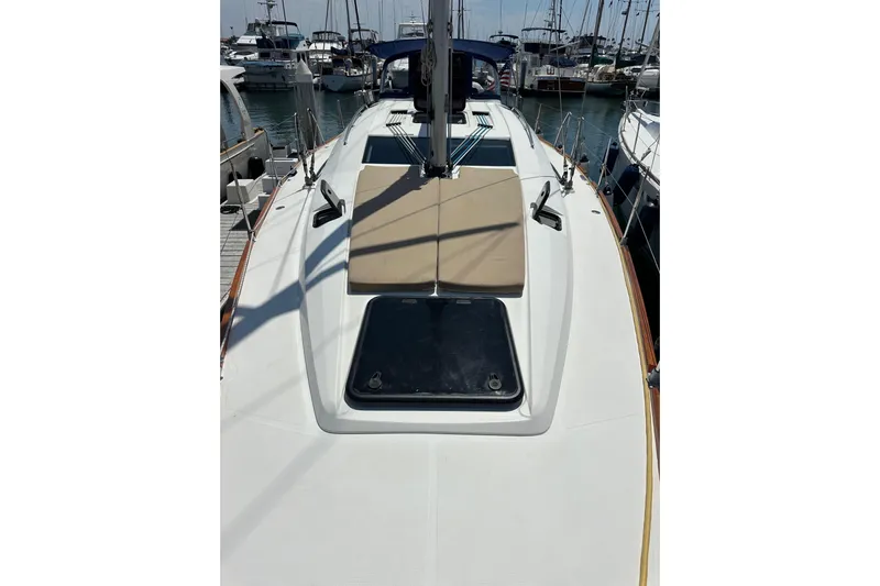 In Stock Now Yacht Photos Pics 2018 Elan 45 Impressions yacht deck with sunbathing area in marina.