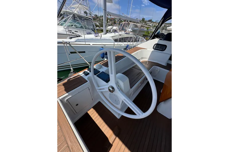 In Stock Now Yacht Photos Pics Steering wheel of 2018 Elan 45 Impressions yacht, docked at marina.