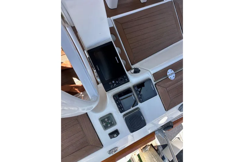 In Stock Now Yacht Photos Pics Control panel of a 2018 Elan 45 Impressions yacht with navigation equipment.