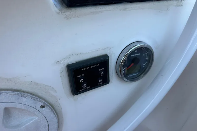 In Stock Now Yacht Photos Pics Control panel of a 2018 Elan 45 Impressions yacht with Volvo Penta display and RPM gauge.