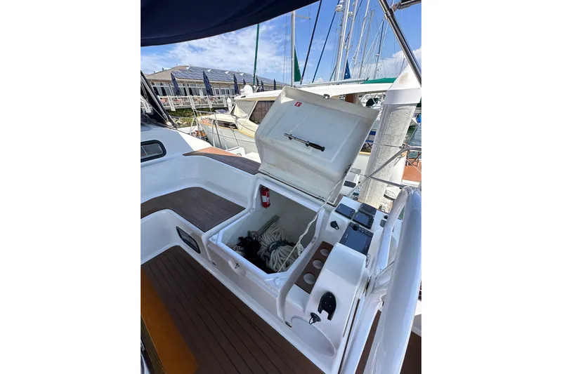 In Stock Now Yacht Photos Pics Open storage compartment on 2018 Elan 45 Impressions yacht, docked at marina.