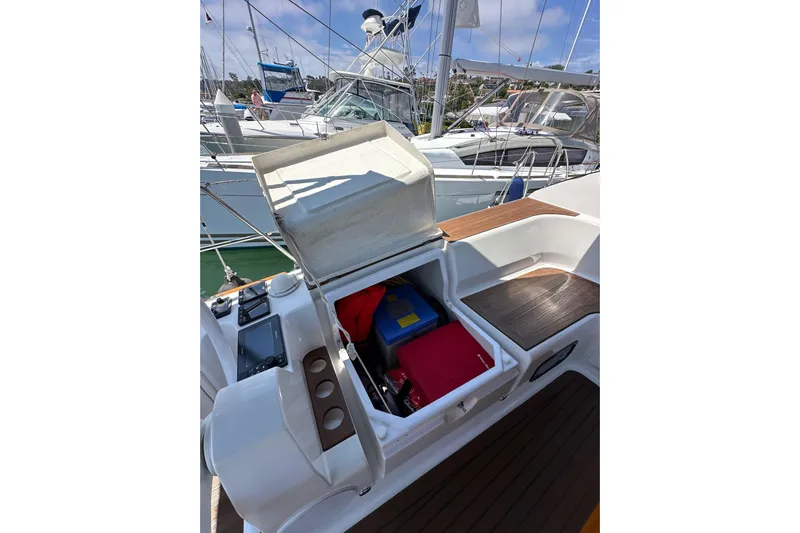 In Stock Now Yacht Photos Pics Open storage compartment on 2018 Elan 45 Impressions yacht, docked at marina.