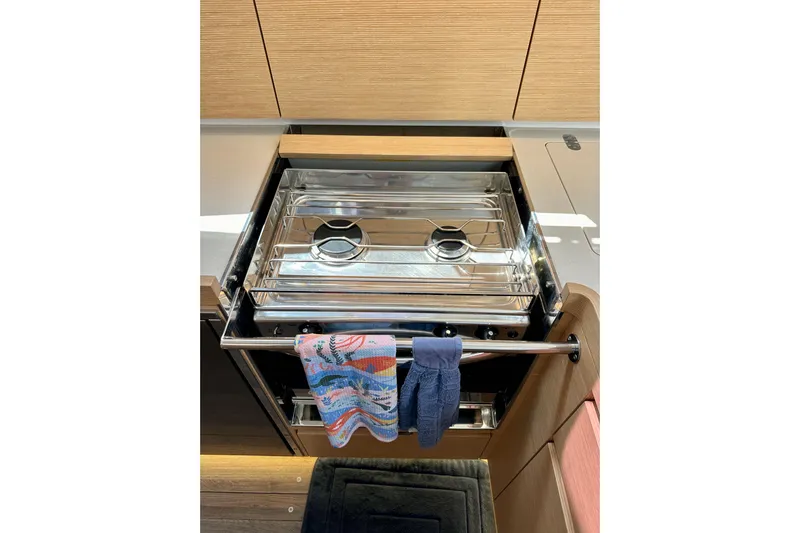 In Stock Now Yacht Photos Pics Stainless steel stove in 2018 Elan 45 Impressions yacht kitchen with colorful towels.