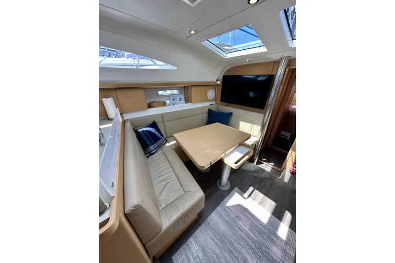 In Stock Now Yacht Photos Pics Interior of 2018 Elan 45 Impressions yacht with modern seating and skylight.