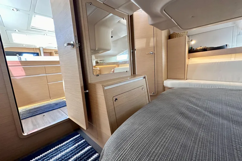 In Stock Now Yacht Photos Pics Luxurious interior of 2018 Elan 45 Impressions yacht with modern wood finish.