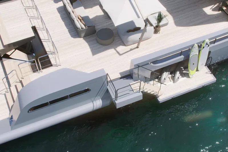  Yacht Photos Pics Luxurious Rossinavi Berserk 47 yacht deck with seating, paddleboards, and water access, 2026 model.