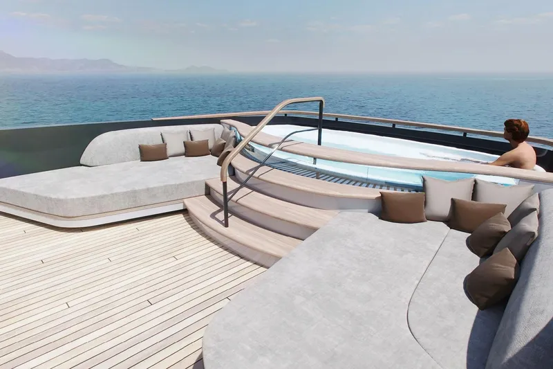  Yacht Photos Pics Luxurious deck of 2026 Rossinavi Berserk 47 yacht with ocean view and seating.