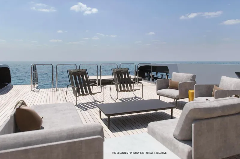  Yacht Photos Pics Luxurious deck of 2026 Rossinavi Berserk 47 yacht with modern outdoor seating.