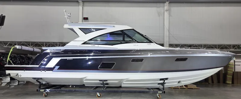  Yacht Photos Pics 2020 Formula 430 Super Sport Crossover boat in a showroom, side view.