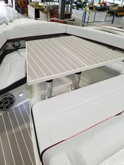  Yacht Photos Pics 2020 Formula 430 Super Sport Crossover interior with white seating and table.