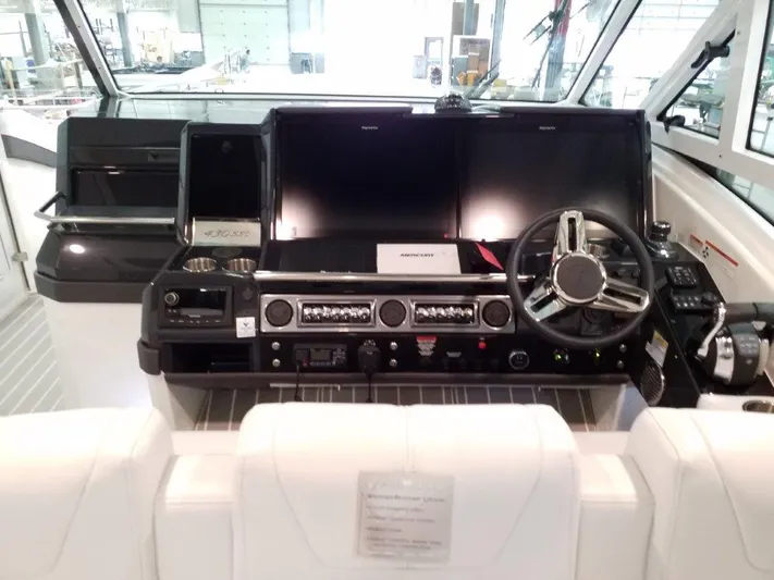  Yacht Photos Pics 2020 Formula 430 Super Sport Crossover helm with advanced navigation and control systems.