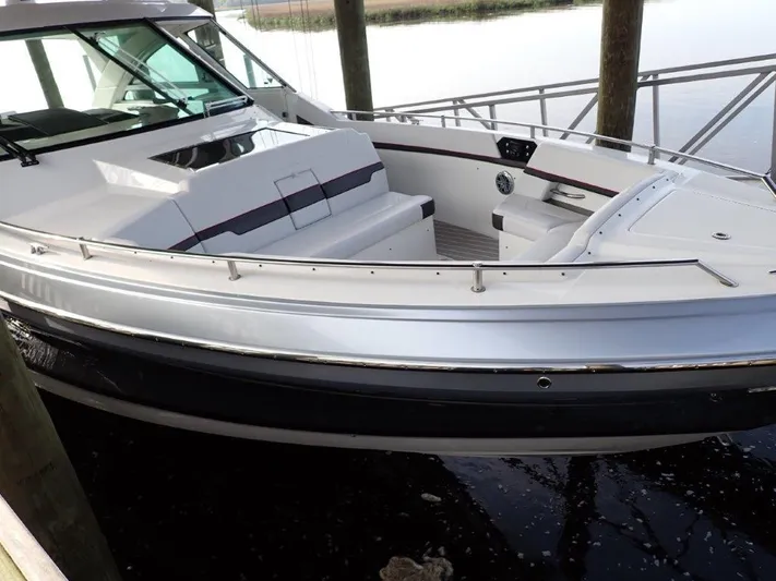 Yacht Photos Pics 2020 Formula 430 Super Sport Crossover boat docked, featuring sleek design and spacious seating.