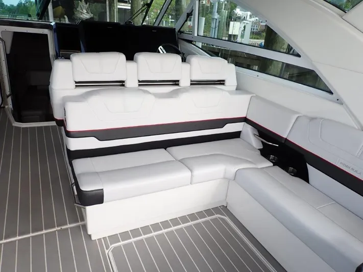  Yacht Photos Pics Luxurious interior of 2020 Formula 430 Super Sport Crossover with white seating and sleek design.