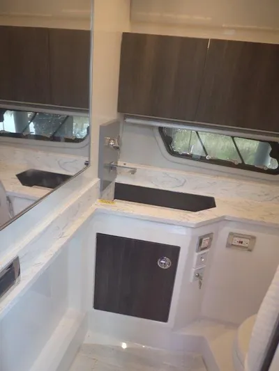  Yacht Photos Pics Interior of 2020 Formula 430 Super Sport Crossover, featuring modern cabinetry and sleek design.