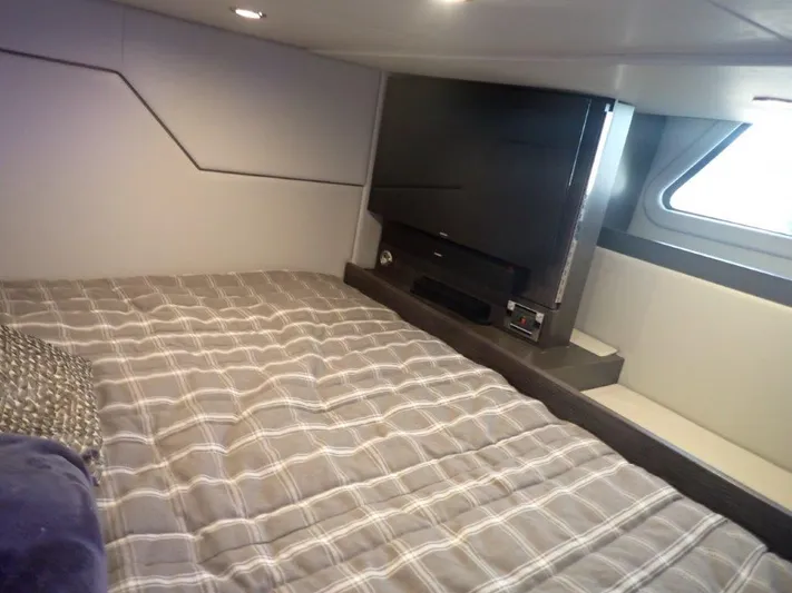  Yacht Photos Pics Interior cabin of 2020 Formula 430 Super Sport Crossover with bed and TV.