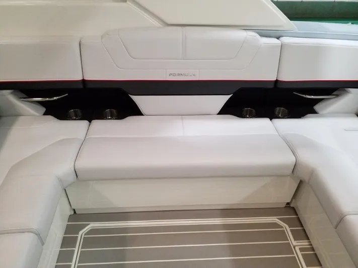  Yacht Photos Pics 2020 Formula 430 Super Sport Crossover interior seating with sleek white upholstery and cup holders.