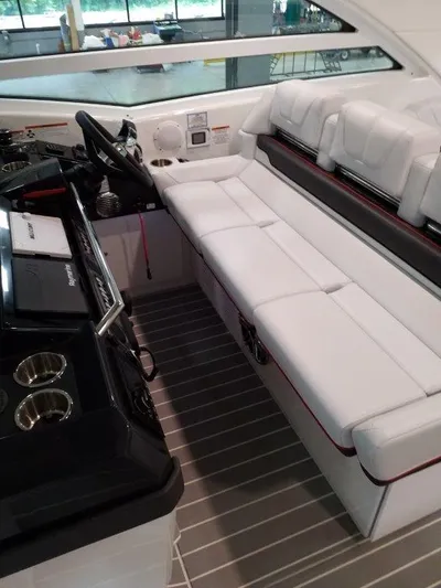  Yacht Photos Pics 2020 Formula 430 Super Sport Crossover interior with white seating and modern dashboard.