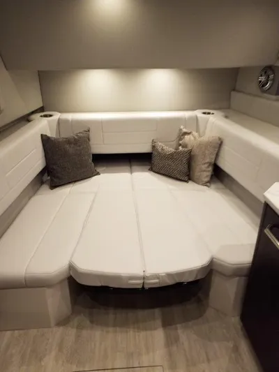 Yacht Photos Pics 2020 Formula 430 Super Sport Crossover interior with plush seating and cushions.