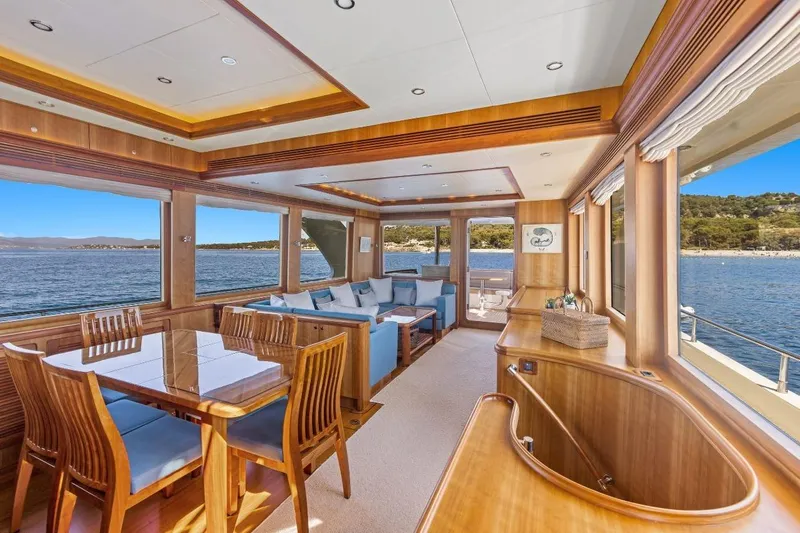Sedna Yacht Photos Pics Luxurious interior of 2020 Jet Tern SELENE 72 yacht with ocean view and elegant furnishings.