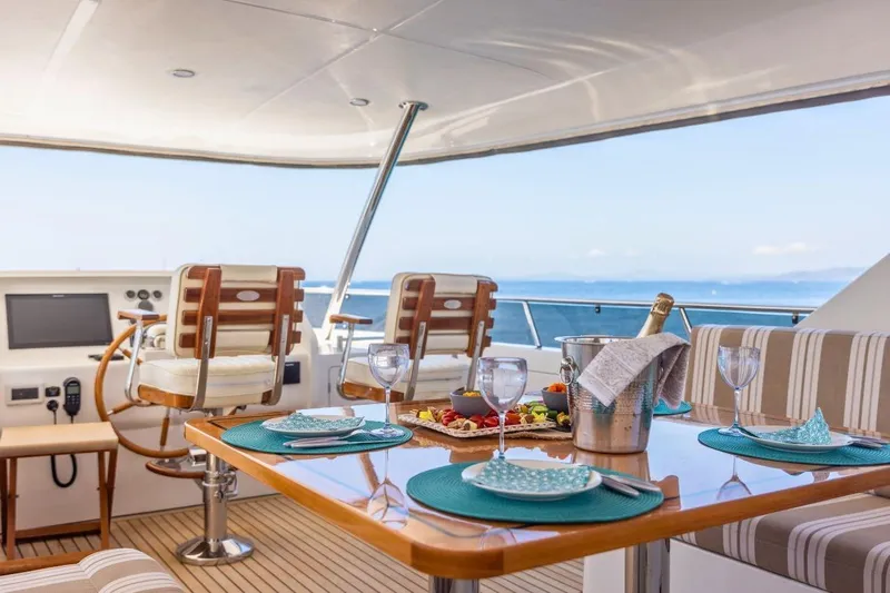 Sedna Yacht Photos Pics Luxurious dining setup on Jet Tern SELENE 72 yacht, 2020 model, with ocean view.