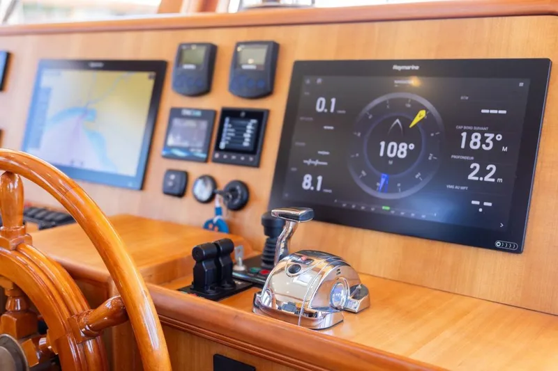 Sedna Yacht Photos Pics Cockpit of 2020 Jet Tern SELENE 72 yacht with navigation displays and controls.