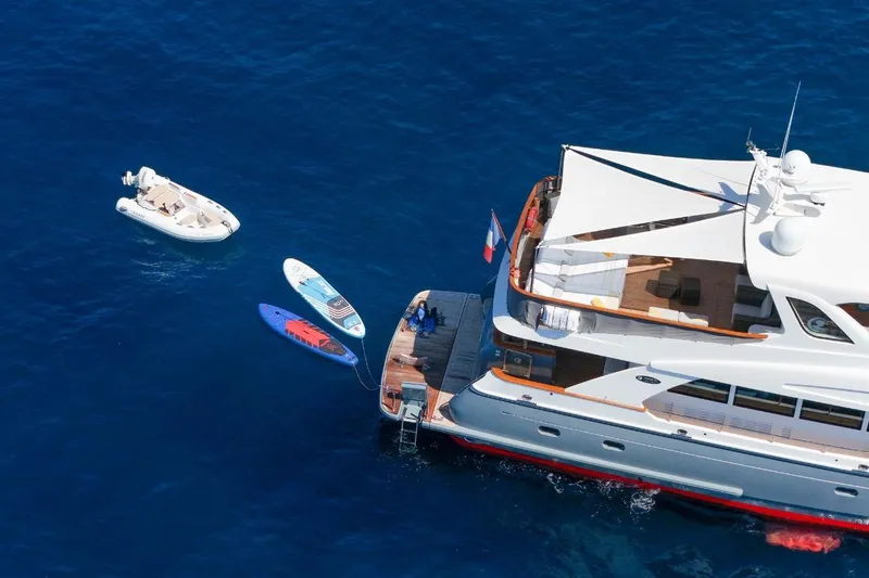 Sedna Yacht Photos Pics Aerial view of Jet Tern SELENE 72 yacht with paddleboards and tender, 2020 model.