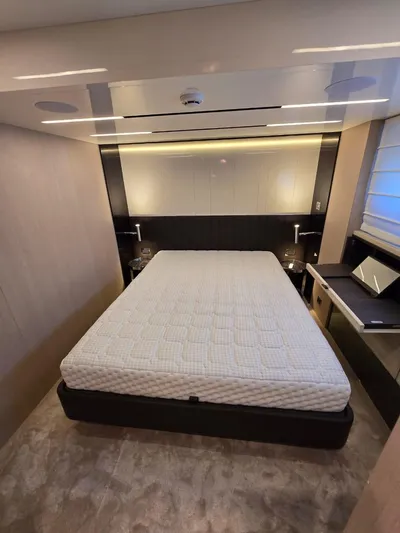 Orca Yacht Photos Pics Luxurious bedroom interior of 2023 Cranchi Sessantasette 67 yacht with modern design.