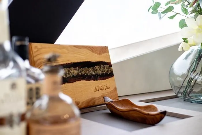 Port To Vino 2 Yacht Photos Pics Decorative wooden art piece on Fountaine Pajot Samana 59 yacht, 2023 model.