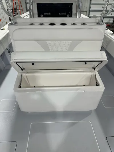  Yacht Photos Pics 2024 Contender 39 ST boat with open storage compartment on deck.